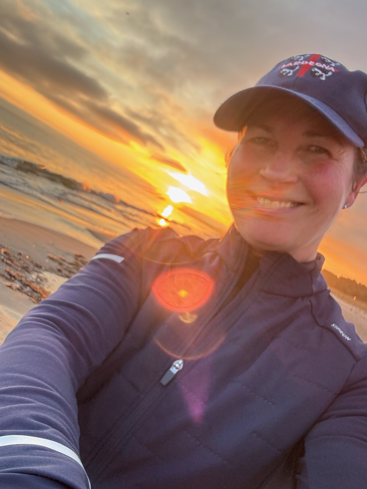 Running coach Kristin Hagel at Bloubergstrand with Table Mountain view